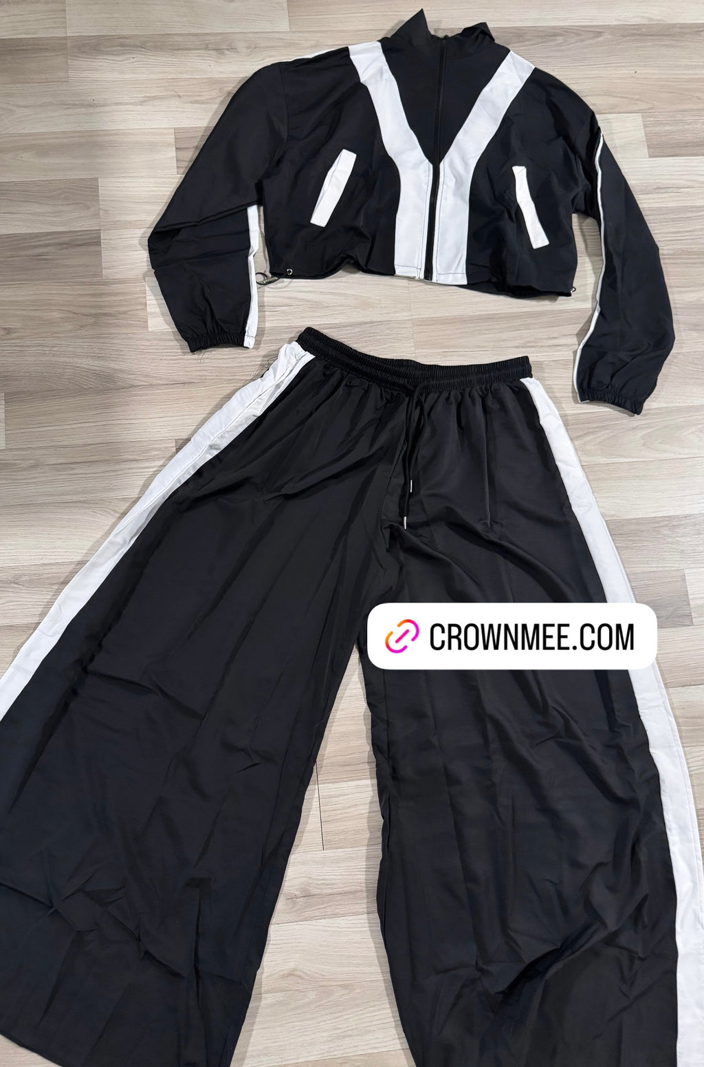 In Her Tracksuit Black